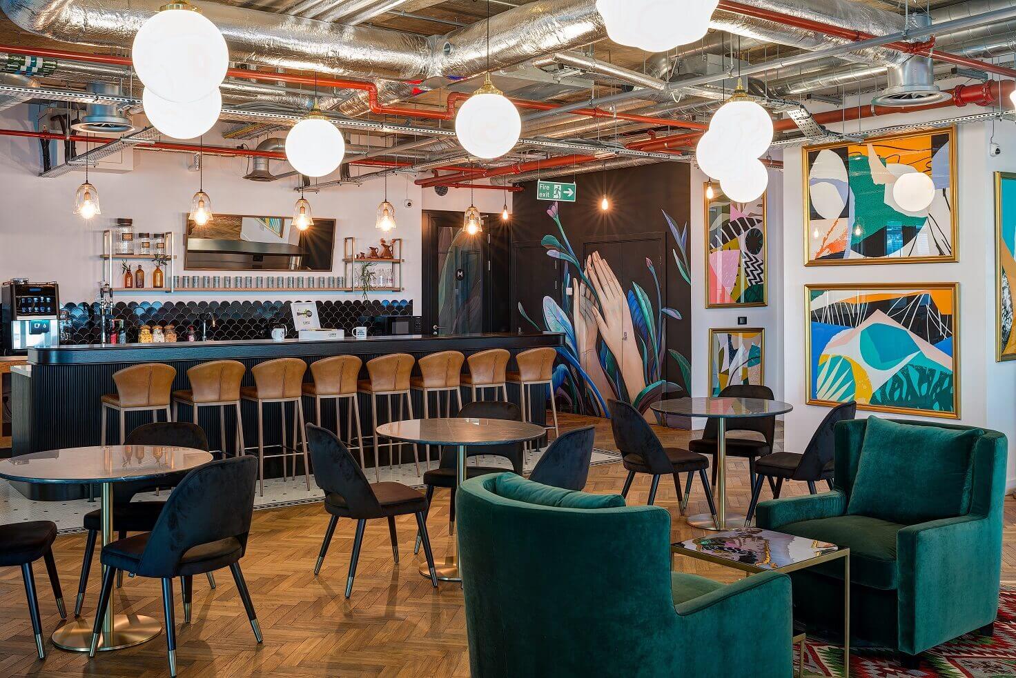 cafe area with tall bar stools by the lounge area at Mindspace Shoreditch - on Tally Workspace