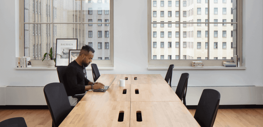 working at a hot desk at Mindspace