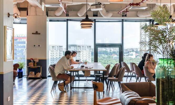 Employees working in open space at a hybrid office