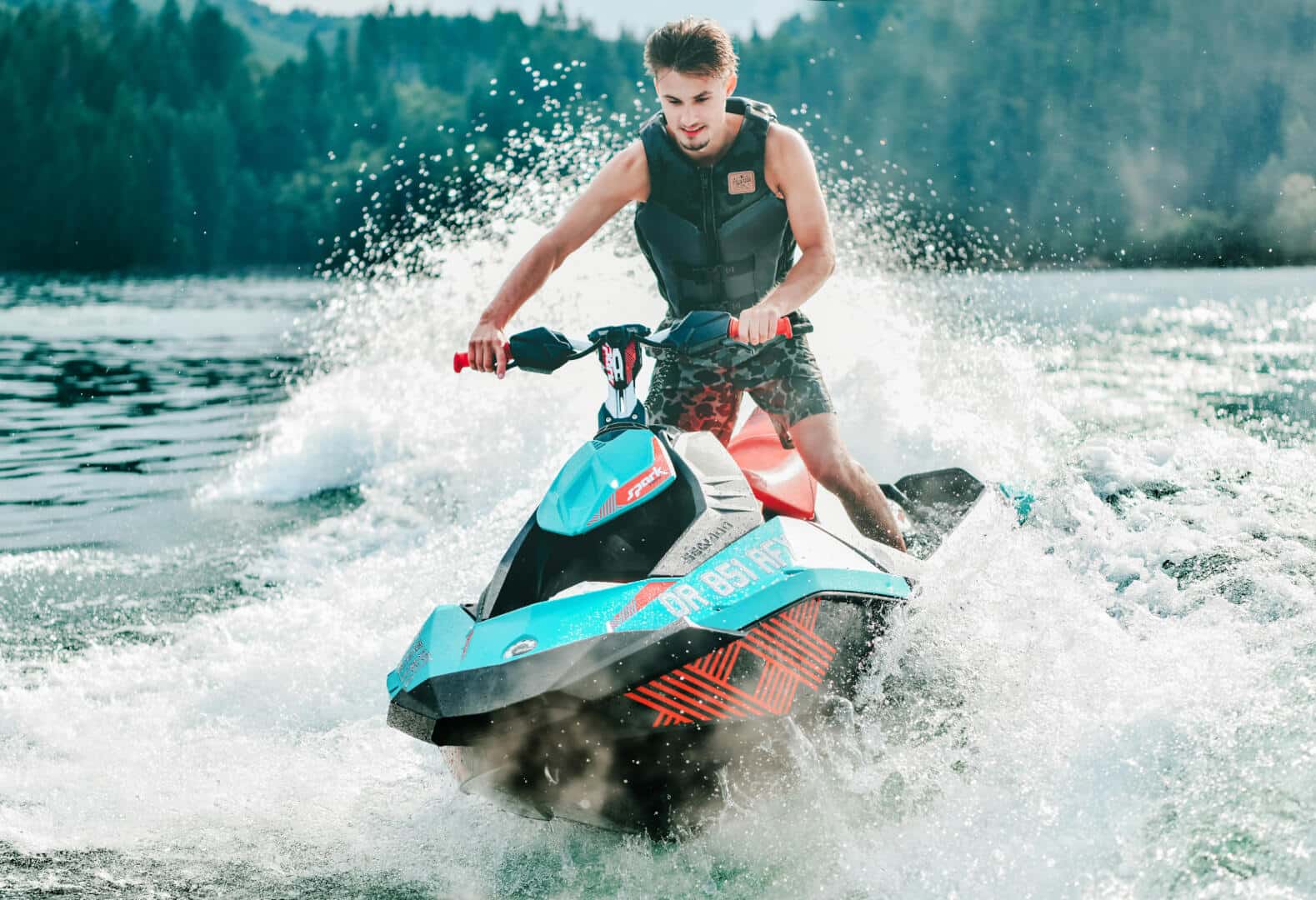 a guy in watercraft, doing watersport