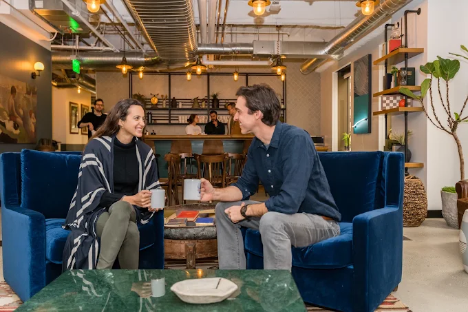 two people chatting with coffee in mindspace san francisco